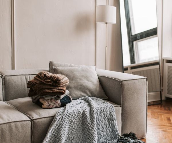 A calm and tidy corner of a room set up for home exercise.